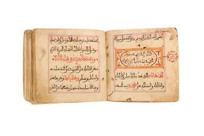 Lot 230 - THREE RELIGIOUS MANUSCRIPTS IN MAGHRIBI SCRIPT