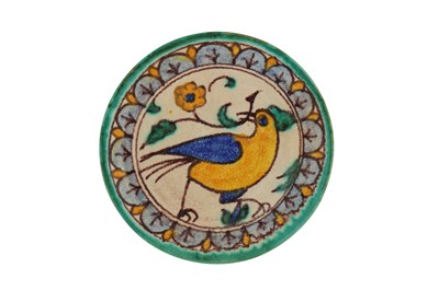 Lot 236 - A SMALL TUNISIAN POLYCHROME-PAINTED CHEMLA POTTERY SAUCER