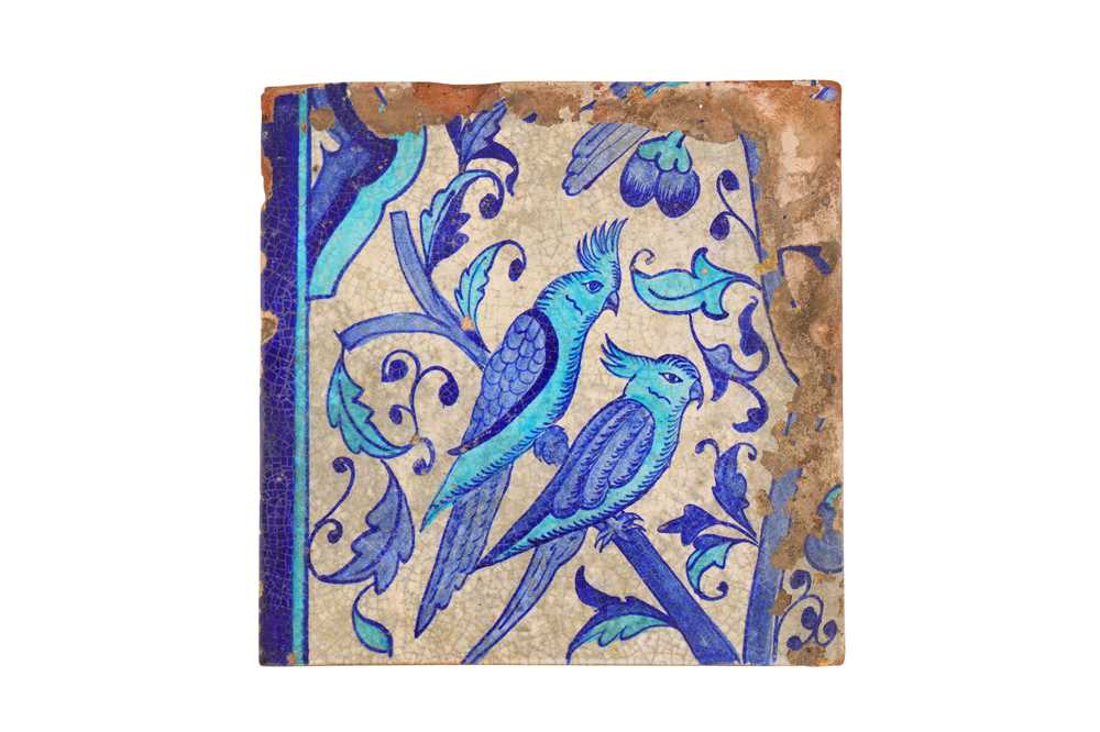 Lot 437 - A MULTAN POTTERY TILE WITH A PAIR OF COCKATOOS