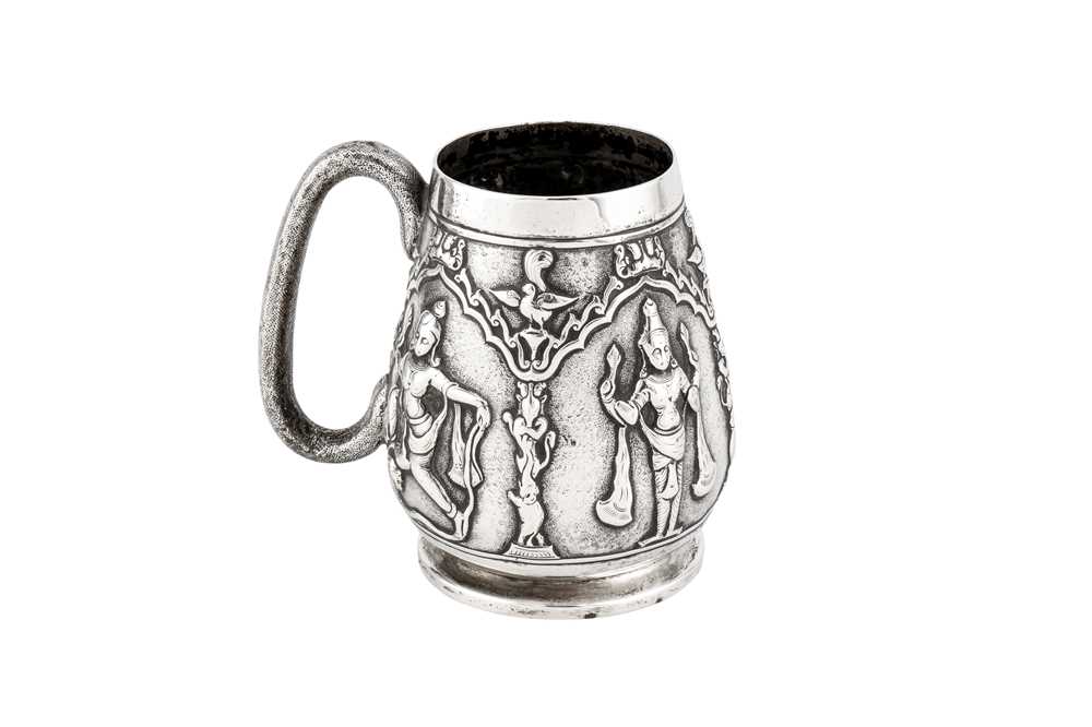 Lot 444 - A LATE 19TH CENTURY ANGLO-INDIAN SILVER CHRISTENING MUG