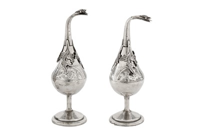 Lot 262 - A PAIR OF LATE 19TH/EARLY 20TH CENTURY EGYPTIAN OR LIBYAN SILVER ROSEWATER SPRINKLERS