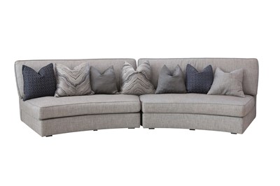 Lot 396 - A LARGE CONTEMPORARY CURVED SOFA