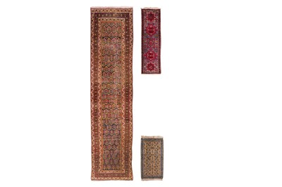 Lot 309 - AN ANTIQUE KURDISH RUNNER AND TWO SMALL PERSIAN RUGS