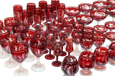 Lot 234 - A SUITE OF OF BOHEMIAN EGERMANN RUBY FLASH DRINKING GLASSES TO SEAT EIGHT