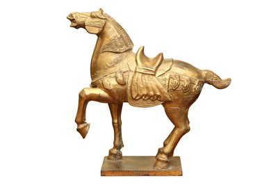 Lot 308 - A CHINESE STYLE CARVED AND GILT WOODEN FIGURE OF A HORSE