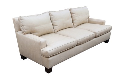 Lot 397 - BAKER, USA; A THREE SEATER SOFA