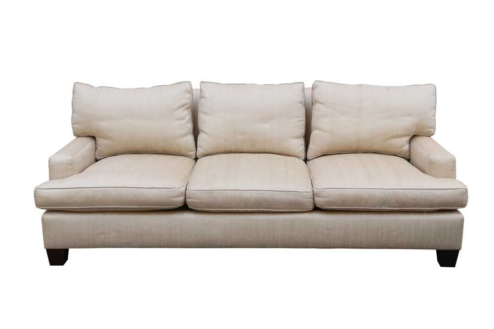 Lot 397 - BAKER, USA; A THREE SEATER SOFA