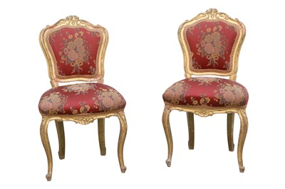 Lot 143 - A PAIR OF LOUIS XV STYLE CARVED GILTWOOD AND GESSO SIDE CHAIRS