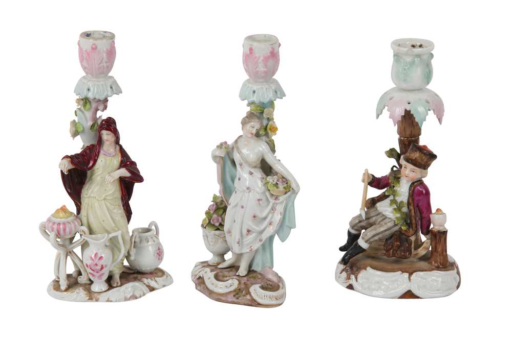 Lot 135 - A PAIR OF RUDOLSTADT VOLKSTEDT PORCELAIN CANDLESTICKS AND A SITZENDORF PORCELAIN CANDLESTICK