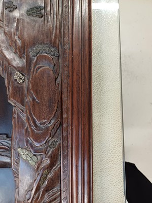 Lot 205 - λ A RARE CHINESE BONE AND IVORY-INLAID HONGMU AND ZITAN 'XIWANGMU' PANEL