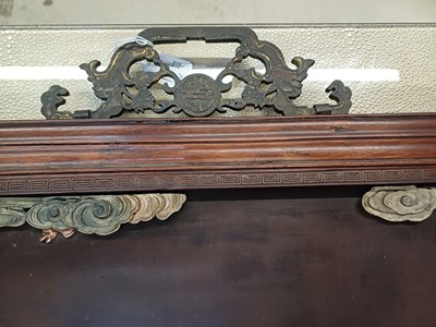 Lot 205 - λ A RARE CHINESE BONE AND IVORY-INLAID HONGMU AND ZITAN 'XIWANGMU' PANEL