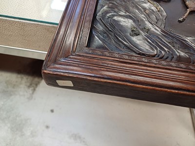 Lot 205 - λ A RARE CHINESE BONE AND IVORY-INLAID HONGMU AND ZITAN 'XIWANGMU' PANEL