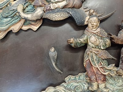 Lot 205 - λ A RARE CHINESE BONE AND IVORY-INLAID HONGMU AND ZITAN 'XIWANGMU' PANEL