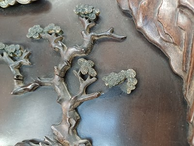 Lot 205 - λ A RARE CHINESE BONE AND IVORY-INLAID HONGMU AND ZITAN 'XIWANGMU' PANEL