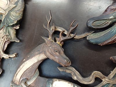 Lot 205 - λ A RARE CHINESE BONE AND IVORY-INLAID HONGMU AND ZITAN 'XIWANGMU' PANEL