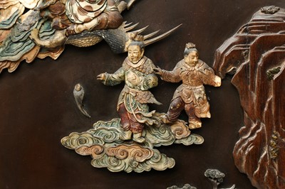 Lot 205 - λ A RARE CHINESE BONE AND IVORY-INLAID HONGMU AND ZITAN 'XIWANGMU' PANEL