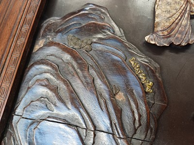 Lot 205 - λ A RARE CHINESE BONE AND IVORY-INLAID HONGMU AND ZITAN 'XIWANGMU' PANEL