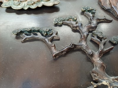 Lot 205 - λ A RARE CHINESE BONE AND IVORY-INLAID HONGMU AND ZITAN 'XIWANGMU' PANEL