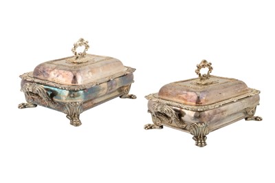 Lot 203 - A PAIR OF GEORGE VI OLD SHEFFIELD SILVER PLATED ENTRÉE DISHES UPON ASSOCIATED WARMING STANDS