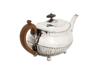 Lot 430 - A George III sterling silver teapot, London 1808 by Thomas Wallis II