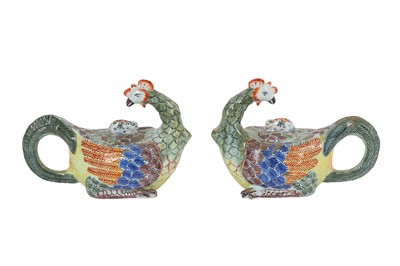 Lot 133 - A PAIR OF FAIENCE TEAPOTS ATER THE MODEL BY J.J. KANDLER