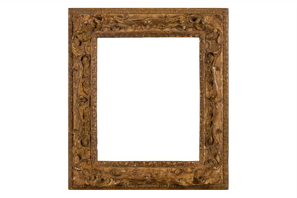 Lot 211 - AN ENGLISH 18TH TH CENTURY CARVED, PIERCED, SWEPT AND GILDED FRAME