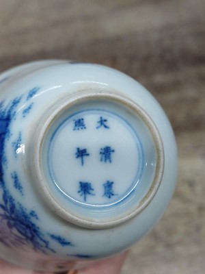 Lot 645 - A CHINESE BLUE AND WHITE 'MONTH' CUP