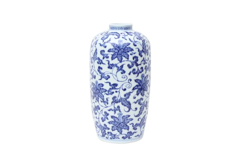 Lot 647 A CHINESE BLUE AND WHITE 'LILIES' VASE