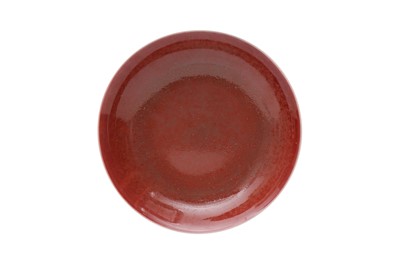Lot 654 - A CHINESE MONOCHROME COPPER RED-GLAZED DISH