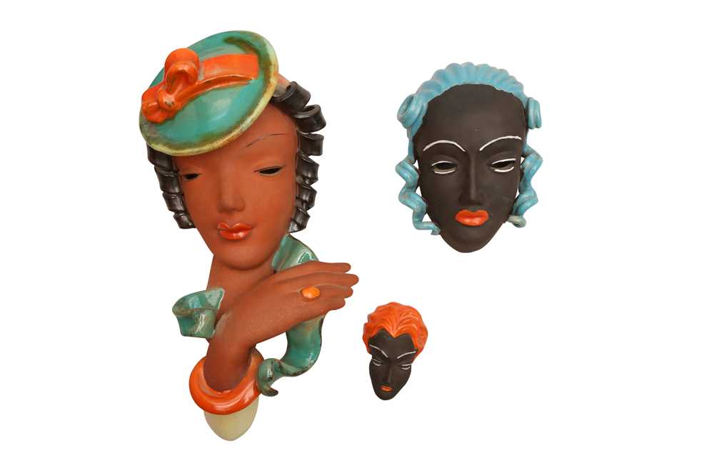 Lot 34 - UNKNOWN (CZECHOSLOVAKIA); THREE TERRACOTTA WALL HANGING MASKS