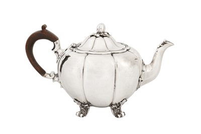 Lot 376 - A Victorian sterling silver teapot, London 1843 by Robert Garrard II (reg. 16th April 1818)