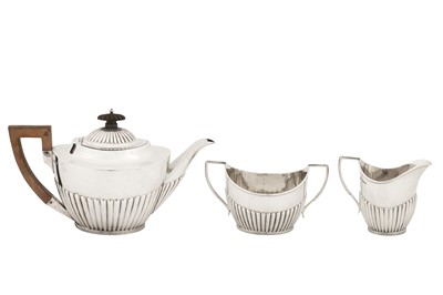 Lot 320 - A George V sterling silver three-piece tea service, Sheffield 1910 by Mappin and Webb