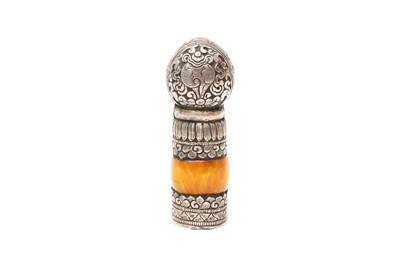 Lot 665 - A TIBETAN SILVER AND AMBER SEAL