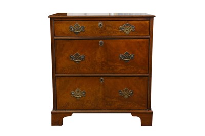 Lot 510 - A GEORGIAN STYLE CROSSBANDED WALNUT CHEST OF DRAWERS