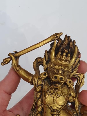 Lot 296 - A SINO-TIBETAN GILT-BRONZE FIGURE OF YAMANTAKA