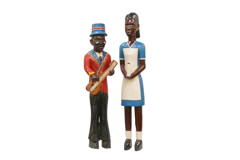 Lot 263 - TWO WEST AFRICAN CARVED AND PAINTED COLON