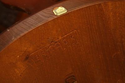 Lot 415 - AN ERCOL ELM OVAL DINING TABLE