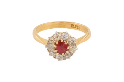 Lot 55 - A RUBY AND DIAMOND CLUSTER RING