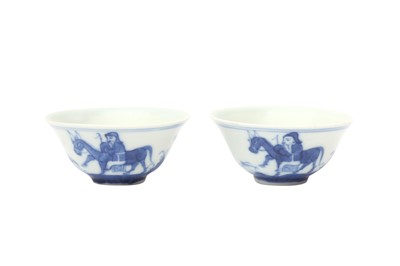 Lot 524 - TWO CHINESE BLUE AND WHITE 'DONKEY' CUPS