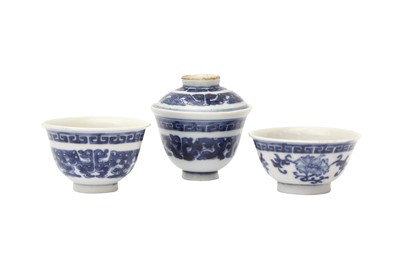 Lot 558 - THREE CHINESE BLUE AND WHITE CUPS