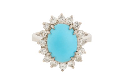 Lot 24 - A TURQUOISE AND DIAMOND CLUSTER RING
