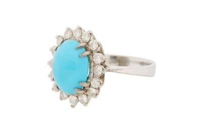 Lot 24 - A TURQUOISE AND DIAMOND CLUSTER RING