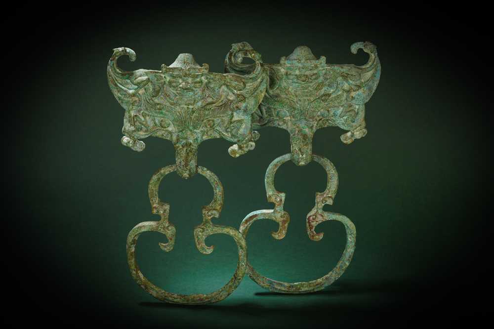 Lot 180 - A PAIR OF CHINESE BRONZE COFFIN HANDLES