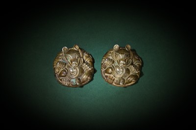 Lot 57 - A PAIR OF CHINESE SILVER 'BEAR' MAT WEIGHTS