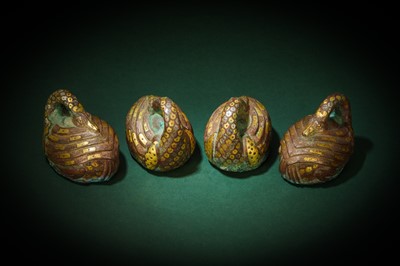 Lot 90 - A RARE SET OF FOUR CHINESE GOLD- AND SILVER- INLAID BRONZE 'GOOSE' MAT WEIGHTS