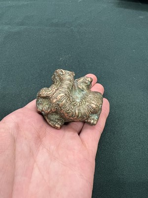 Lot 138 - A CHINESE BRONZE 'TIGER AND BEAR' SCROLL WEIGHT