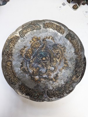 Lot 242 - A CHINESE PARCEL-GILT SILVERED COPPER-ALLOY 'DRAGON' DISH