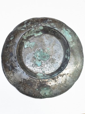 Lot 242 - A CHINESE PARCEL-GILT SILVERED COPPER-ALLOY 'DRAGON' DISH