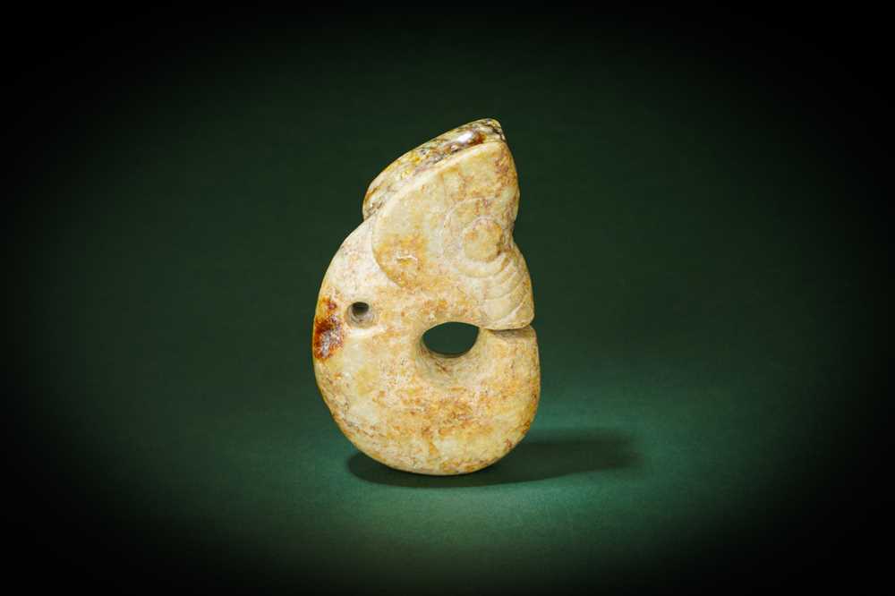 Lot 201 - A LARGE ARCHAIC JADE CARVING OF A 'PIG DRAGON'