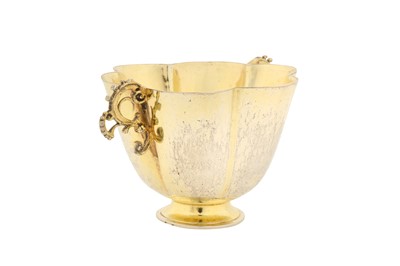 Lot 233 - An early 17th century German silver gilt twin handled cup, Augsburg 1625-1630 by David Roll (master 1605, d. between 1638-43)